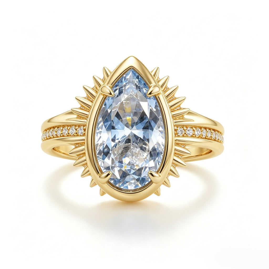 Gold Pear-Cut Aquamarine Sunburst Halo Ring