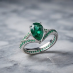 Silver Pear-Cut Emerald Channel-Set Ring