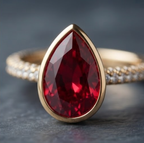 Gold Pear-Cut Ruby Halo Swirl Ring