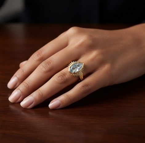Gold Pear-Cut Aquamarine Sunburst Halo Ring