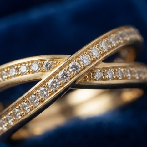 Gold Pear-Cut Blue Sapphire Crossover Ring