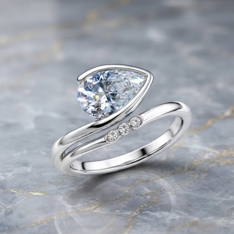 Silver Pear-Cut Diagonal Bezel Asymmetric Ring